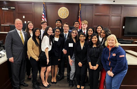 Members gather in the Forsyth County courthouse following a competition.