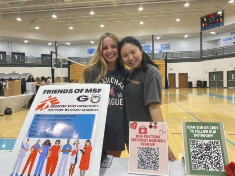 Club leaders Lilly du Toit and Amelia Tang promote Doctors Without Borders.