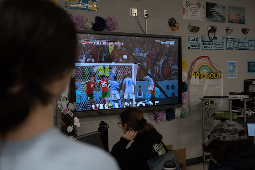 Students watch round 16 of the World Cup intensely.