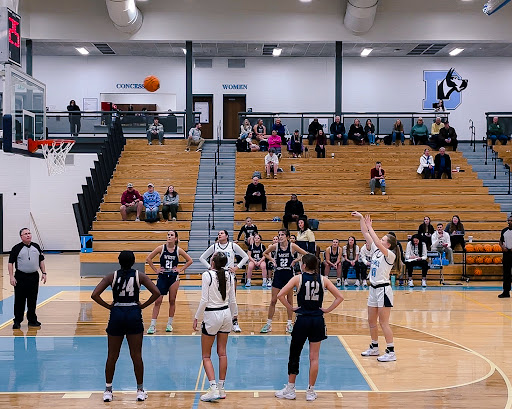 Emma Hempker taking the free throw shot scoring her 1000th point