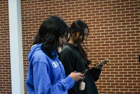 Rather than engaging in conversation, many teens prefer to spend their time browsing social media platforms, including TikTok.