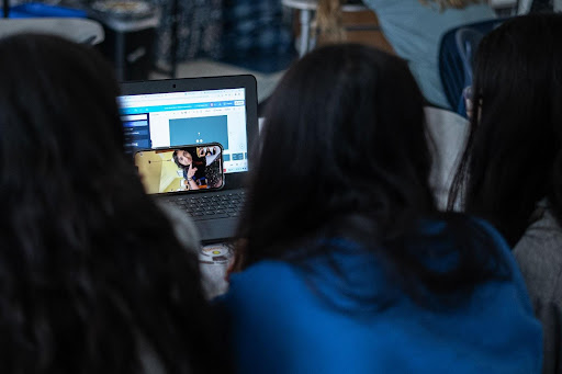 Students being able to connect with their friends who are at home through technology.