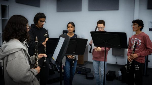 The Denmark Band practicing a musical selection.